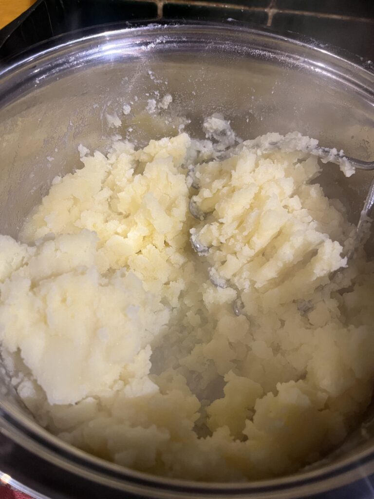 mashing potatoes