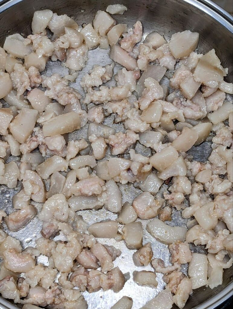 rendering pork fat in a pan